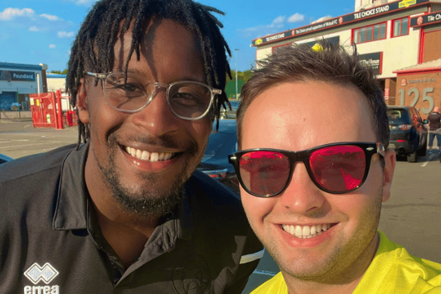 Oli, pictured here with club captain Donervon Daniels, is a huge Walsall fan