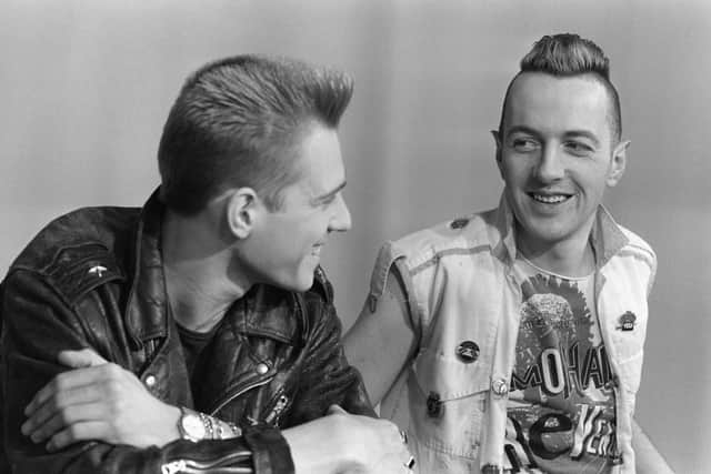 Clash members Paul Simonon and Joe Strummer. (Picture: Philippe Wojazer/AFP via Getty Images)