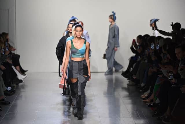 Models present creations for Kseniaschnaider during the Ukrainian Fashion Week show on the fifth day of the London Fashion Week. (Picture: Justin Tallis/AFP via Getty Images)