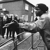 A man appealing to riot police guarding the British National Party (BNP) bookshop and headquarters in Welling, south east London, during a demonstration on May 8 over the racist murder of Stephen Lawrence two weeks earlier. It was closed down by Bexley