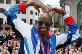 Britain’s double Olympic gold medallist Mo Farah makes his trademark “Mobot” gesture. (Picture: Stefan Wermuth/AFP/GettyImages)