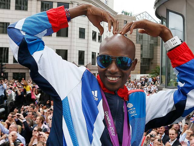 Britain’s double Olympic gold medallist Mo Farah makes his trademark “Mobot” gesture. (Picture: Stefan Wermuth/AFP/GettyImages)