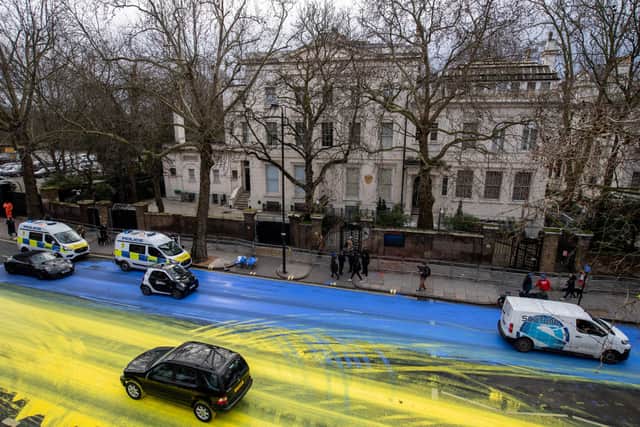 The street outside the Russian Embassy was turned blue and yellow on Thursday morning. Credit: Getty Images
