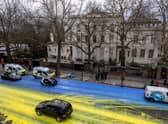 The street outside the Russian Embassy was turned blue and yellow on Thursday morning. Credit: Getty Images