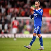 James Maddison applauds the fans following the English Premier League football match between Manchester United and Leicester City (Photo by OLI SCARFF/AFP via Getty Images)