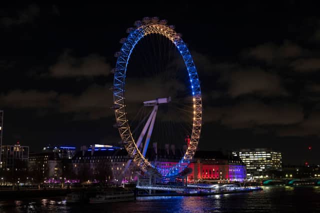 The London Eye lit up with the colours of the Ukrainian flag to mark the anniversary of the war. Credit: Getty Images