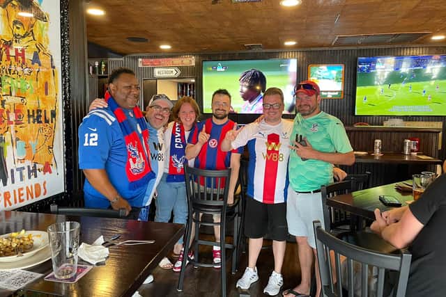 Crystal Palace fans watch the side all the way from Indianapolis