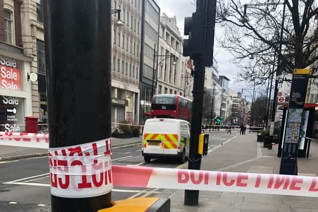 A police cordon in Oxford Street, central London, following a stabbing on a bus.