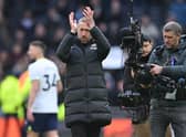 Chelsea’s English head coach Graham Potter applauds supporters on the pitch after the English Premier League football match  (Photo by JUSTIN TALLIS/AFP via Getty Images)