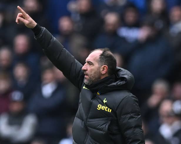 Tottenham Hotspur’s Italian assistant head coach Cristian Stellini gestures on the touchline during the English Premier League (Photo by JUSTIN TALLIS/AFP via Getty Images)