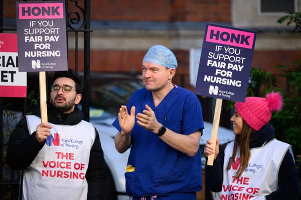 NHS workers and supporters picket outside the Royal Marsden hospital on February 6. (Picture: Leon Neal/Getty Images)