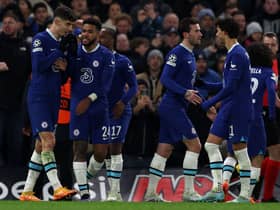 Chelsea’s German midfielder Kai Havertz (L) is mobbed by teammates after scoring the team’s second goal  (Photo by ADRIAN DENNIS/AFP via Getty Images)