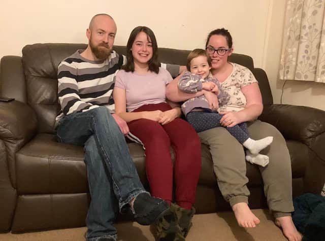 Jasmine Allmond with daughters Haylee and Karina, and  husband Chris Allmond.