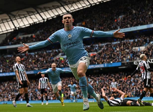 English midfielder Phil Foden celebrates after scoring the opening goal of the English Premier League (Photo by PAUL ELLIS/AFP via Getty Images)
