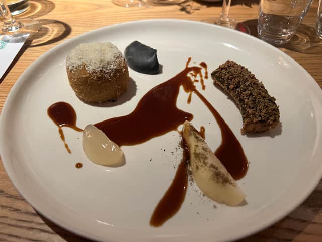 Tree nut roast with a chestnut and coffee sauce, smoked banana, cashews and a touch of pear. 
