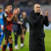  Pep Guardiola applauds the fans after the UEFA Champions League round of 16, first-leg (Photo by ODD ANDERSEN/AFP via Getty Images)