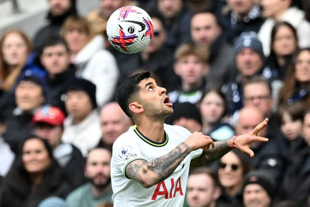 Argentinian defender Cristian Romero controls the ball. (Picture: JUSTIN TALLIS/AFP via Getty Images)