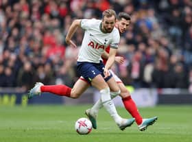 Tottenham’s Harry Kane is challenged by Remo Freuler of Nottingham Forest. (Photo by Catherine Ivill/Getty Images)