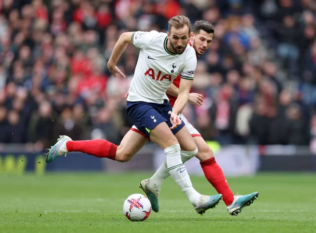 Tottenham’s Harry Kane is challenged by Remo Freuler of Nottingham Forest. (Photo by Catherine Ivill/Getty Images)