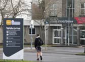 A man has been arrested on suspicion of terrorism offences after a woman was stabbed outside a leisure centre. The woman was attacked outside the centre in Cheltenham on Thursday night and was taken to hospital where she is now said to be in a stable condition. 