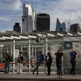 Members of the public waiting for buses from London Bridge station during a strike in August. (Picture: Dan Kitwood/Getty Images)