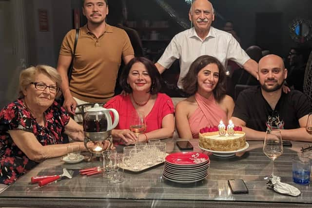 Anoosheh Ashoori at home with his wife Sherry (centre left), daughter Elika (centre right) and son Aryan (right)