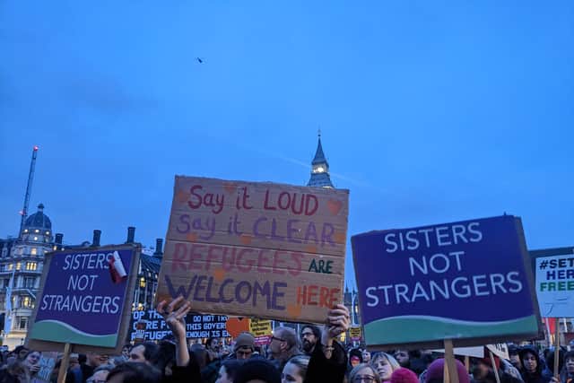 Hundred gathered in Parliament Square to protest the Illegal Immigration Bill. Credit: Lynn Rusk