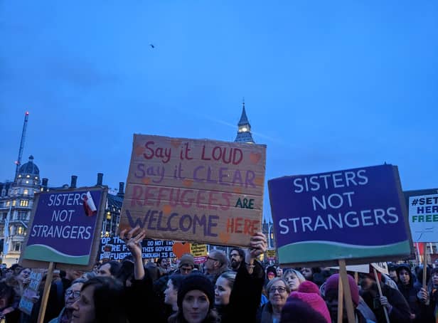 Hundred gathered in Parliament Square to protest the Illegal Immigration Bill. Credit: Lynn Rusk