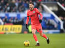 Adam Lallana of Brighton & Hove Albion runs with the ball during the Premier League match  (Photo by Michael Regan/Getty Images)