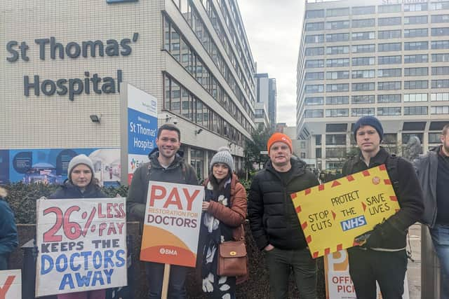 Adam Watson (far right) and his colleagues on the picket line outside St Thomas’s Hospital. Credit: Lynn Rusk