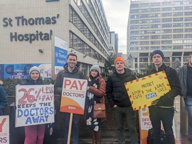 Adam Watson (far right) and his colleagues on the picket line outside St Thomas’s Hospital. Credit: Lynn Rusk