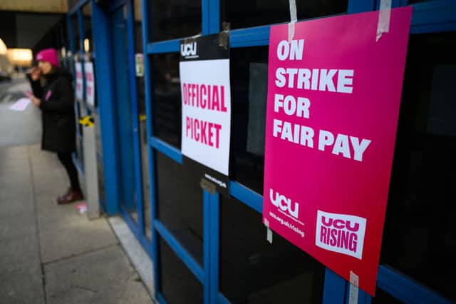 ‘On strike for better pay’. (Photo by Leon Neal/Getty Images)