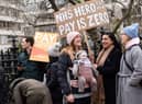 Demonstrators hold placards as they take part in a protest by junior doctors. Picture: NIKLAS HALLE’N/AFP via Getty Images