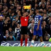 Wesley Fofana of Chelsea leaves the pitch due to an injury during the UEFA Champions League group (Photo by Catherine Ivill/Getty Images)