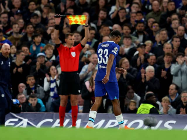 Wesley Fofana of Chelsea leaves the pitch due to an injury during the UEFA Champions League group (Photo by Catherine Ivill/Getty Images)