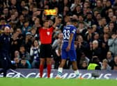 Wesley Fofana of Chelsea leaves the pitch due to an injury during the UEFA Champions League group (Photo by Catherine Ivill/Getty Images)