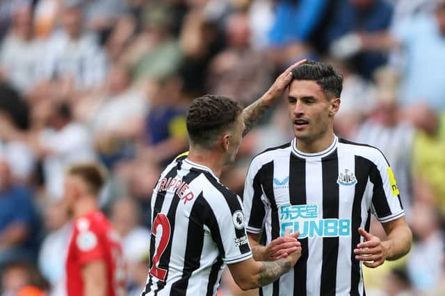 Newcastle United's Fabian Schar and Kieran Trippier (Photo by NIGEL RODDIS/AFP via Getty Images)