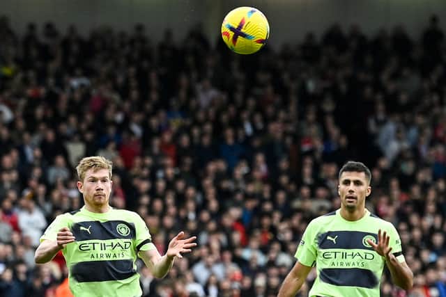 Manchester City’s Kevin De Bruyne and Rodri (JUSTIN TALLIS/AFP via Getty Images)
