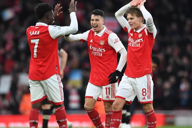 Arsenal trio Bukayo Saka, Gabriel Martinelli and Martin Odegaard (Photo by David Price/Arsenal FC via Getty Images)