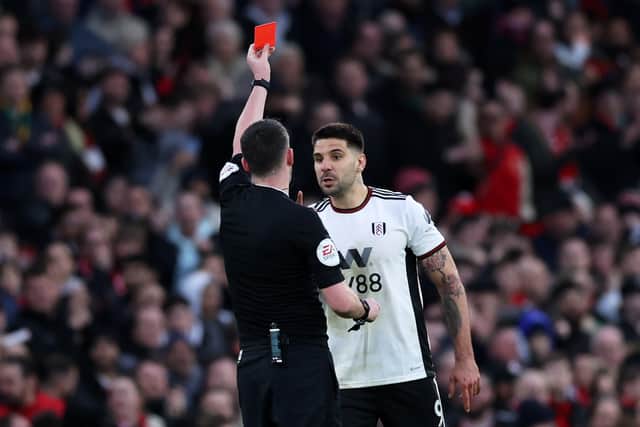 Chris Kavanagh took only a second to show Mitrovic red after he was pushed by the striker (Image: Getty Images) 