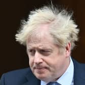 Boris Johnson leaves from 10 Downing Street in February  2022. (Photo by JUSTIN TALLIS/AFP via Getty Images)