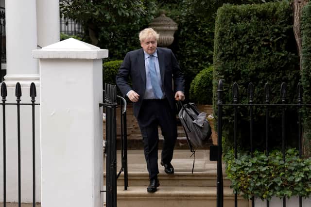 Former PM Boris Johnson leaving his home for the Commons Privileges Committee