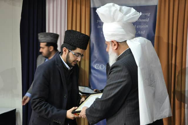 Imam Adeel Shah (left) with His Holiness, Hazrat Mirza Masroor Ahmad (right). Credit: Supplied