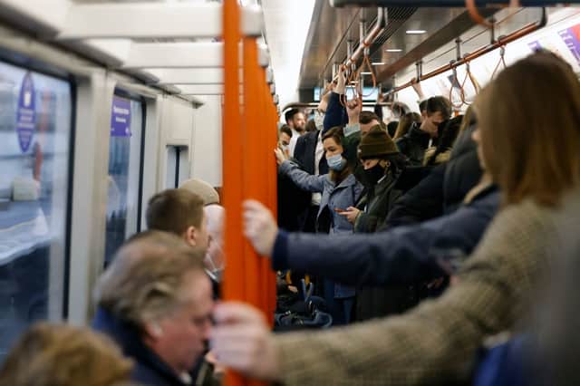 Passengers on a London Overground train