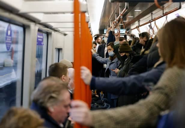 Passengers on a London Overground train