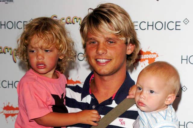 TV personality Jeff Brazier and his sons Bobby Jack (L) and Freddie (R) attend the HomeChoice Enchanted Wood Tea Party at The Music Room on July 20, 2005 in London, England. (Photo by Chris Harding/Getty Images)