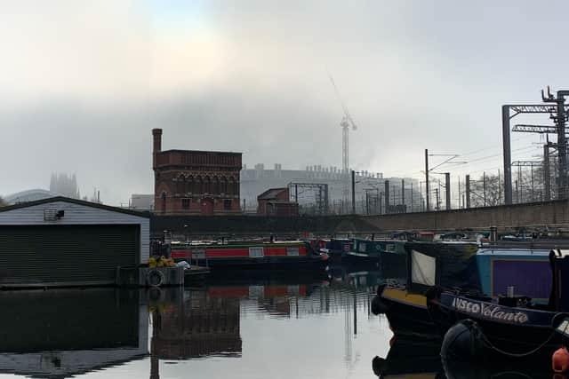 The Regent’s Canal at King’s Cross, with St Pancras and the Crick Institute visible through the mist.