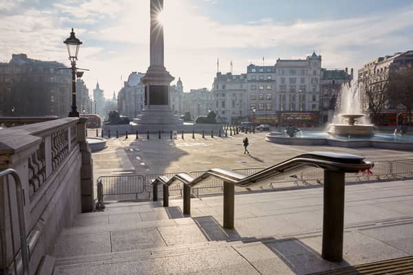 One of London’s most famous sites, Trafalgar Square here is almost empty, save for one person taking a photo in the plaza.