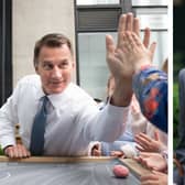 Chancellor of the Exchequer Jeremy Hunt and minister for intergovernmental relations Michael Gove. (Photo by Stefan Rousseau WPA Pool/Leon Neal/AFPGetty Images)