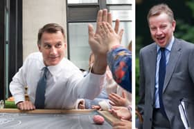 Chancellor of the Exchequer Jeremy Hunt and minister for intergovernmental relations Michael Gove. (Photo by Stefan Rousseau WPA Pool/Leon Neal/AFPGetty Images)